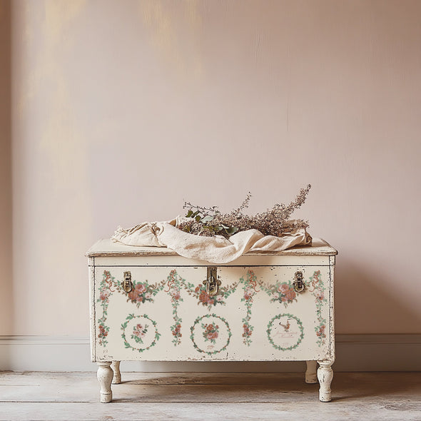Example project with La Folie Paint Inlay applied to a vintage chest with floral wreaths