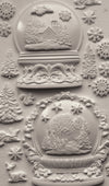 Resin cast made with IOD Snow Globe Mould showing festive details
