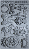 Silicone mould render of the IOD Victoriana Mould showing intricate scroll and flourish designs.