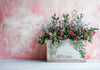 Holiday floral arrangement in a rustic wooden box decorated with IOD Holly & Pine Stamp.