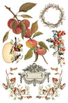 Transfer sheet with apples, holly, wreath, and bird illustrations from IOD Santa’s Hollow.