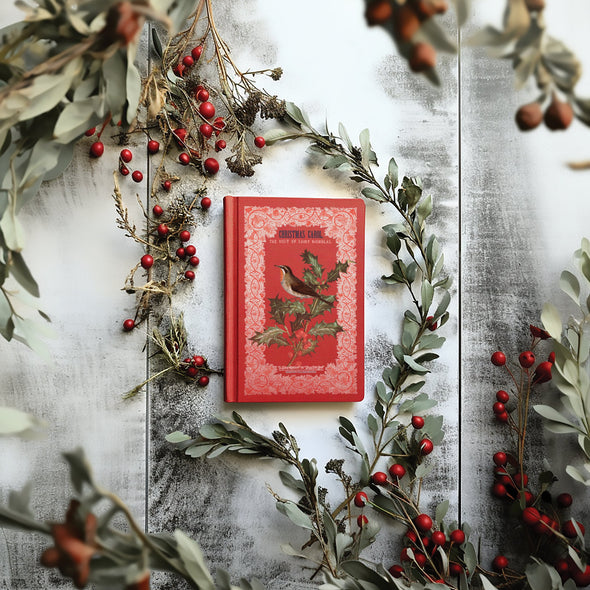 Example project showing Winter Botanist transfer applied to red Christmas book cover.